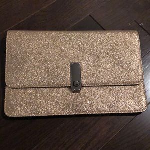 Brand new Express oversized gold clutch